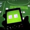 Play poker WITH, not just ON, your mobile phone