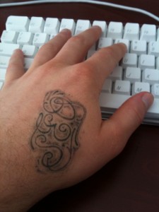 SEO hand tattoo