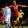 Andy Carroll wins the race