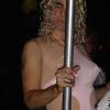Homeless woman tries to strip for cash