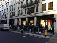 Thousands queue as iPhone 4S goes on sale to the public queues for iPhone 4S