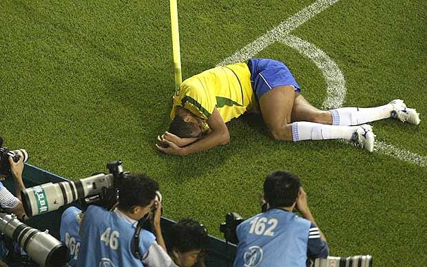 Brazilian soccer player Rivaldo takes a dive