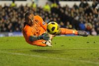 Tottenham's Heurelho Gomes makes a save