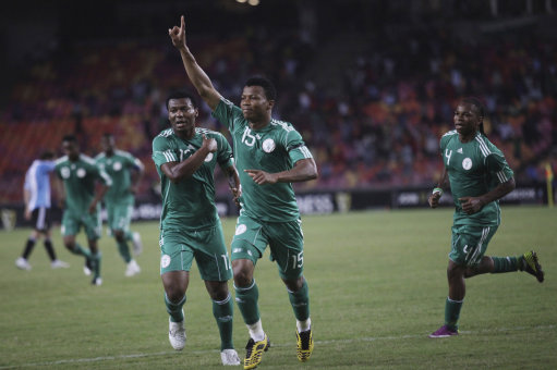 Nigerian players celebrate goal