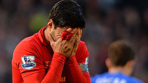 Luis Suarez receives a 10-match ban after biting the Chelsea defender Branislav Ivanovic