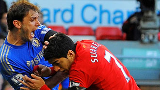 Luis Suarez receives a 10-match ban after biting the Chelsea defender Branislav Ivanovic