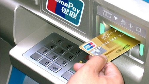 China limits overseas UnionPay cash withdrawals