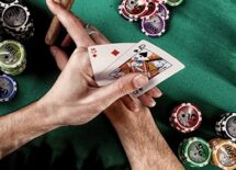 Poker player holding cards
