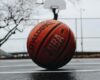 NBA branded basketball on a blacktop court