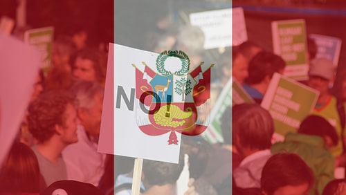 Flag of Peru against a background of a protest