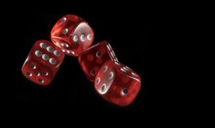 Shot of dice thrown. Concept of gambling