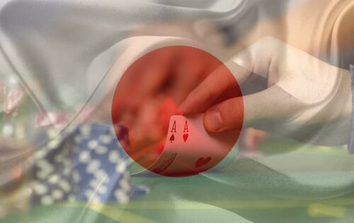 Japanese flag over a picture of a hand