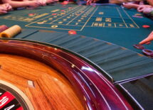 Roulette table with people playing