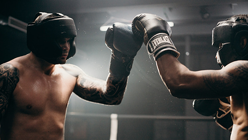 Man in black boxing gloves