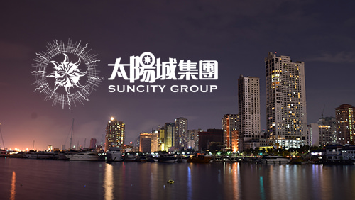 Suncity group logo with Manila city on the background