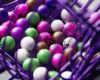 Purple lottery game in close-up with different colored balls with numbers