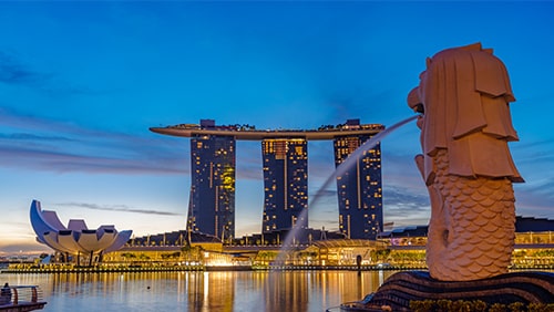 Singapore Merlion Park downtown Singapore business district at sunrise