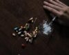 Top view of different drugs on a wooden table