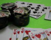 Photo of some casino chips and playing cards
