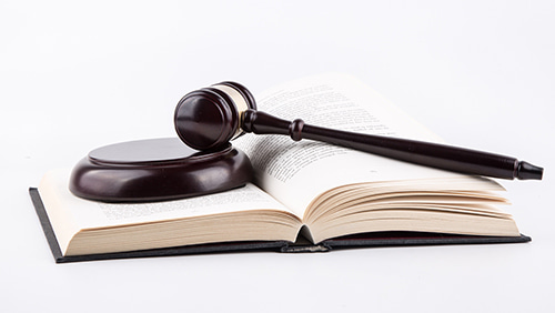 Gavel in top of a book