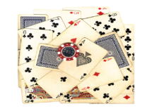 old-vintage-cards-and-gambling-chip-with-clipping