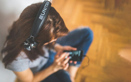 A girl listening music in her headphones