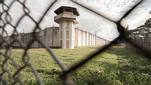 Prison with iron fences.