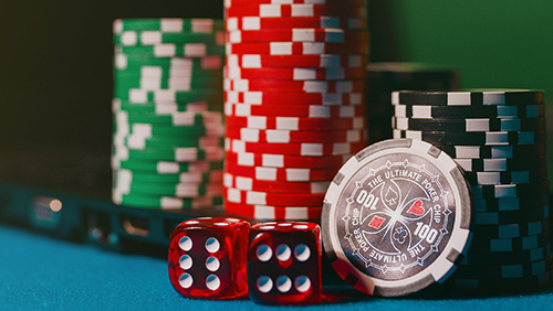 Zoomed photo of poker chips and dice