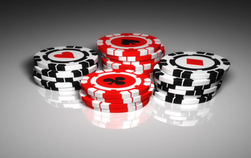 poker-chips-on-white-table