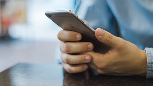 A man using a mobile phone