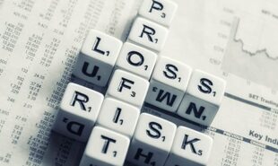 Different letter tiles spelling "Profit" , "Loss" and "Risk"