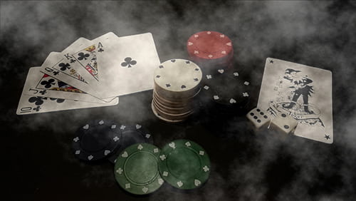 Foggy table with casino gaming materials