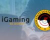 iGaming Academy and LSLB logo against a background of businessmen shaking hands