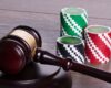 Casino chips and gavel in gambling legal concept